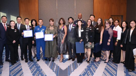 : Members of Kheir Clinic’s Board of Directors, along with the CEO, legislative staff, and event honorees, stand together for a group photo.